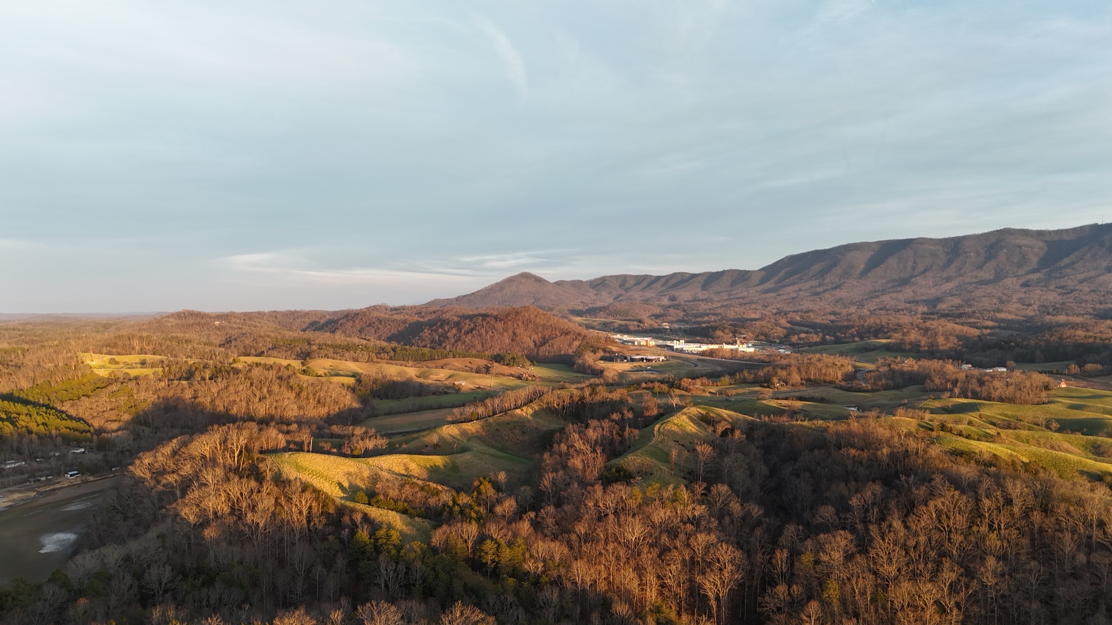 Golden aerial view of rolling hills